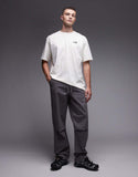 The North Face Adventure backprint oversized t-shirt in off white.