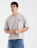 ASOS DESIGN boxy oversized T-shirt with retro music graphic in washed gray.