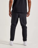 Nike Club Woven Tapered Leg Pants –