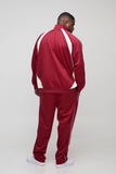 boohooMAN Plus size men's tracksuit in color block knit, regular fit and funnel neck