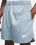 NIKE SPORTSWEAR SPORT ESSENTIALS WOVEN LINED FLOW SHORTS