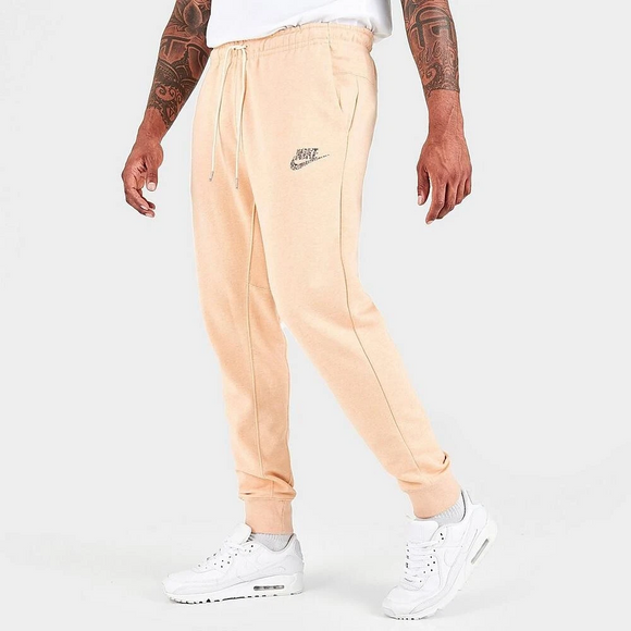 Nike Men's Revival Fleece Joggers Light Orange